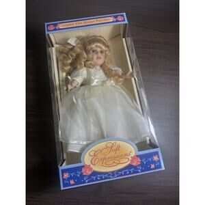 soft expressions porcelain doll. genuine fine bisque collectible in original